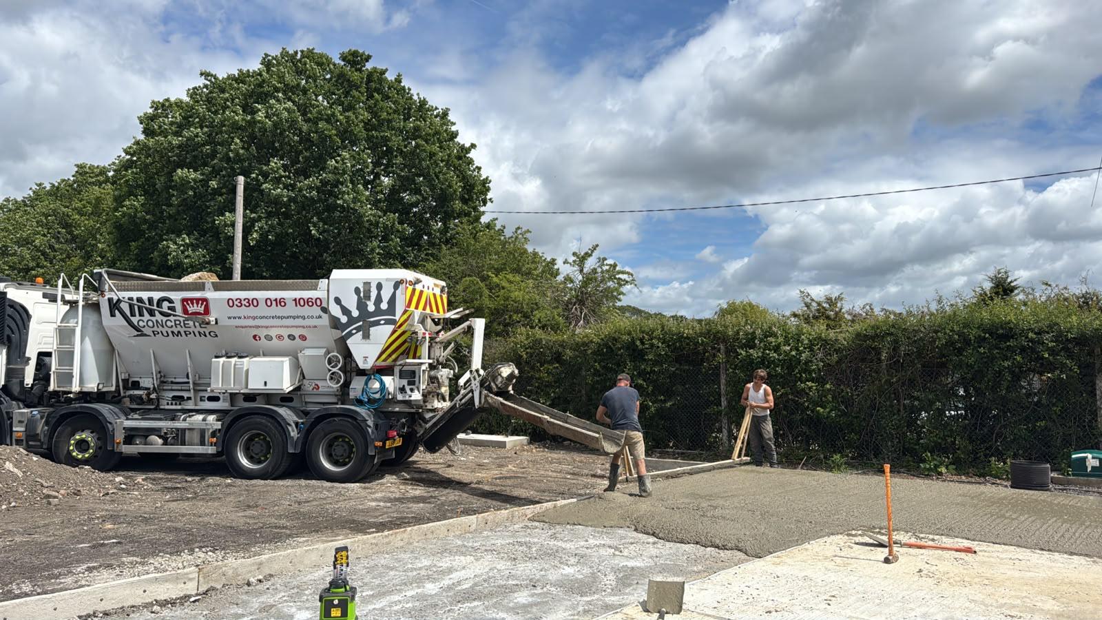 King Concrete Pumping crew placing concrete on a Dulwich site